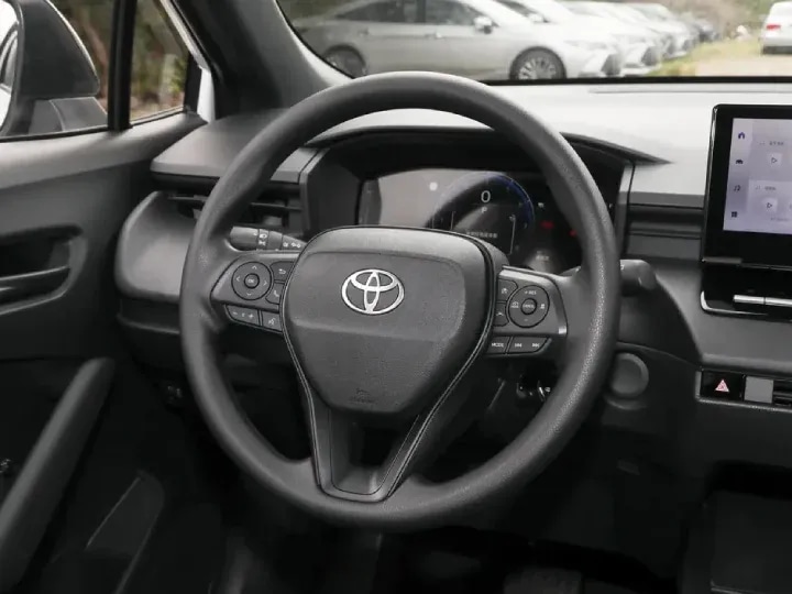2026 Toyota Corolla Cross 2.0L HEV White Inside Black - Beyond Autos - www.beyondautos.com