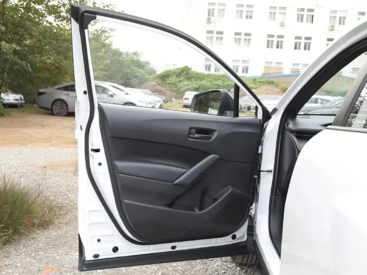 2026 Toyota Corolla Cross 2.0L HEV White Inside Black - Beyond Autos - www.beyondautos.com