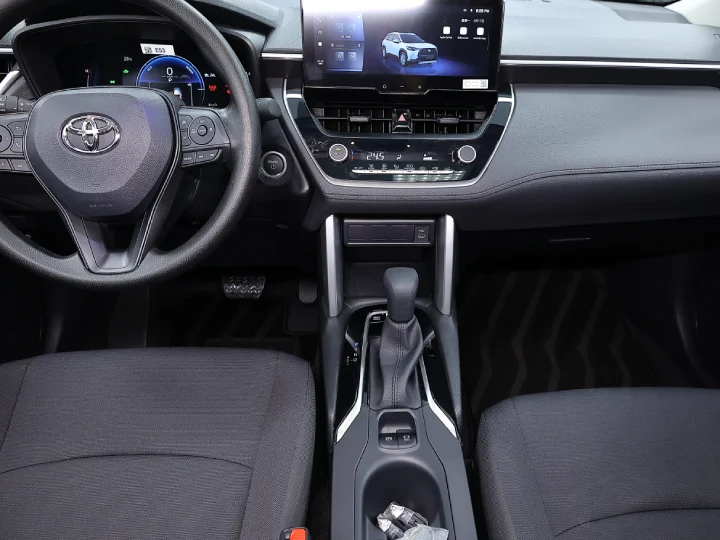 2026 Toyota Corolla Cross 2.0L HEV White Inside Black - Beyond Autos - www.beyondautos.com