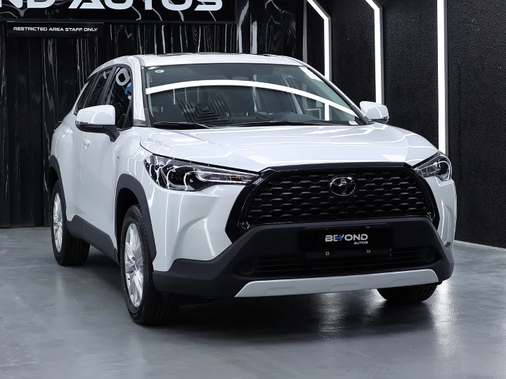 2026 Toyota Corolla Cross 2.0L HEV White Inside Black - Beyond Autos - www.beyondautos.com