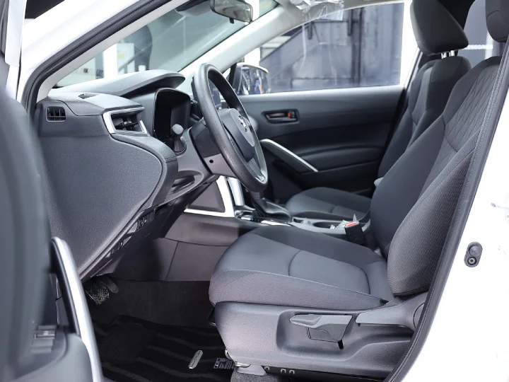 2026 Toyota Corolla Cross 2.0L HEV White Inside Black - Beyond Autos - www.beyondautos.com