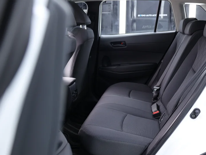 2026 Toyota Corolla Cross 2.0L HEV White Inside Black - Beyond Autos - www.beyondautos.com